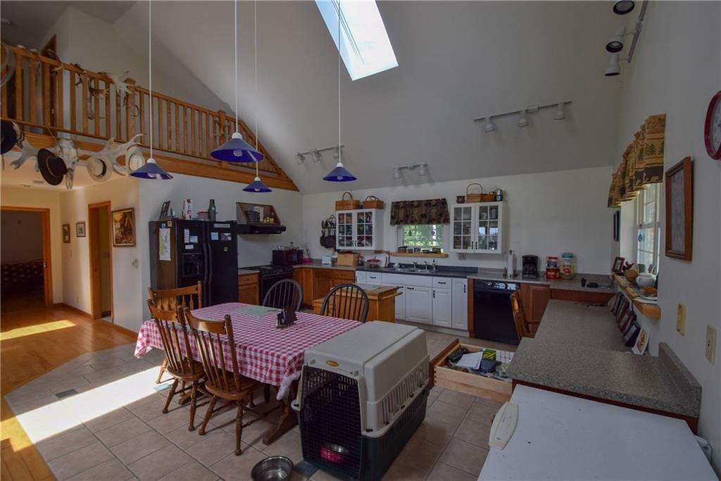 115 Barleyville Road Patten, ME 04765 - Photo 19 of 35 View from the living room into the...