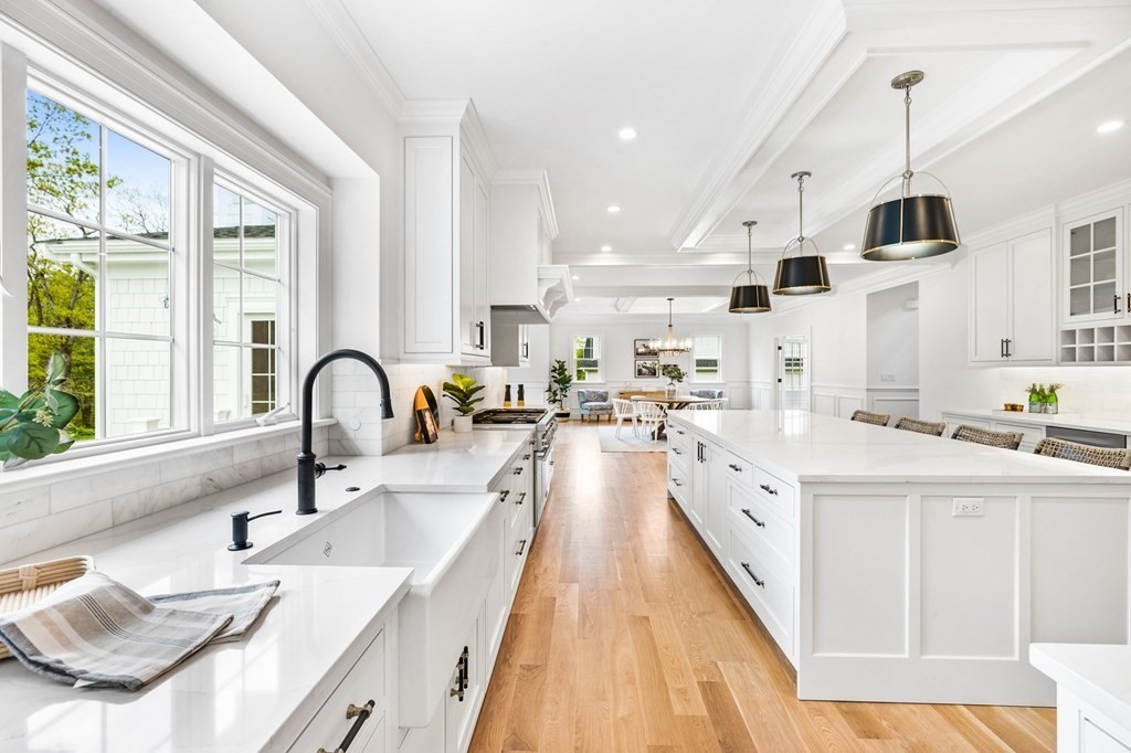 4 Jordan Way Hingham, MA 02043 - Photo 13 of 42 a kitchen with stainless steel appliances a sink a stove and a wooden floors