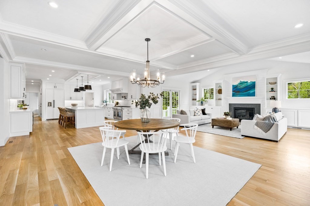 4 Jordan Way Hingham, MA 02043 - Photo 17 of 42 a view of a dining room with furniture wooden floor and chandelier