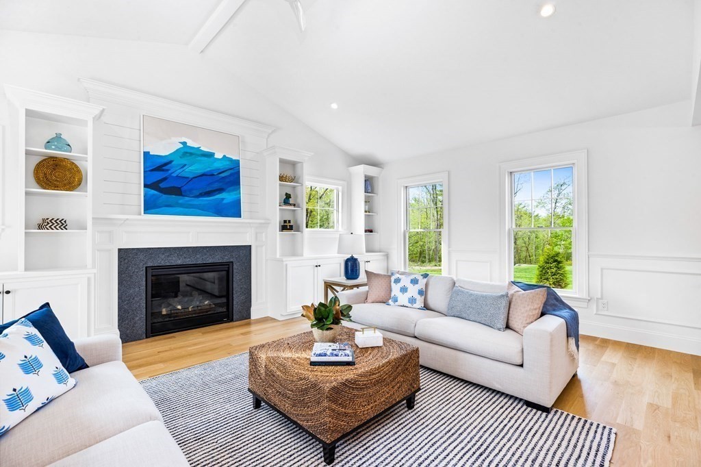 4 Jordan Way Hingham, MA 02043 - Photo 20 of 42 a living room with furniture and a fireplace