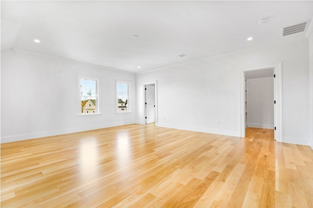 4 Jordan Way Hingham, MA 02043 - Photo 36 of 42 a view of empty room with wooden floor and fan