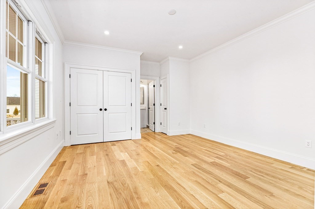 4 Jordan Way Hingham, MA 02043 - Photo 38 of 42 a view of empty room with wooden floor and fan
