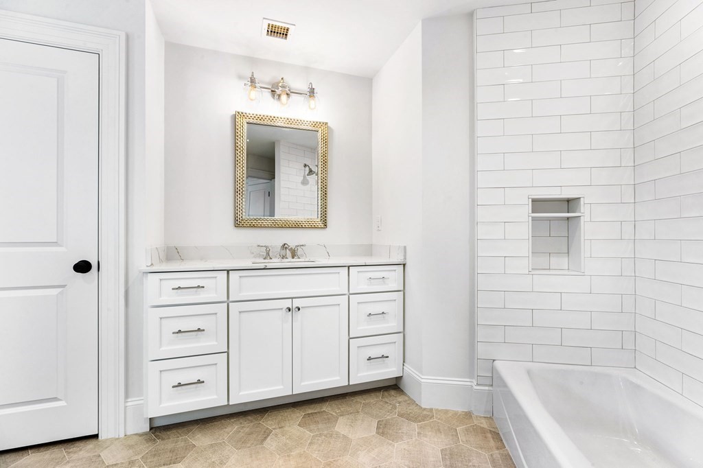 4 Jordan Way Hingham, MA 02043 - Photo 39 of 42 a bathroom with a sink and a bathtub