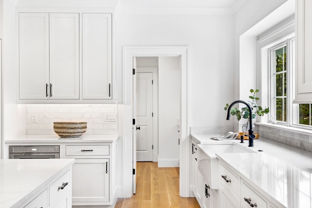 4 Jordan Way Hingham, MA 02043 - Photo 6 of 42 a view of a kitchen with a sink