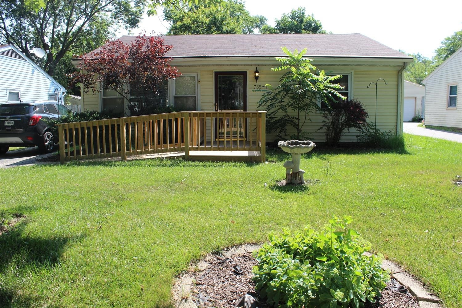 735-1 Juniper Road Valparaiso, IN 46385 - Photo 1 of 10 a front view of a house with garden