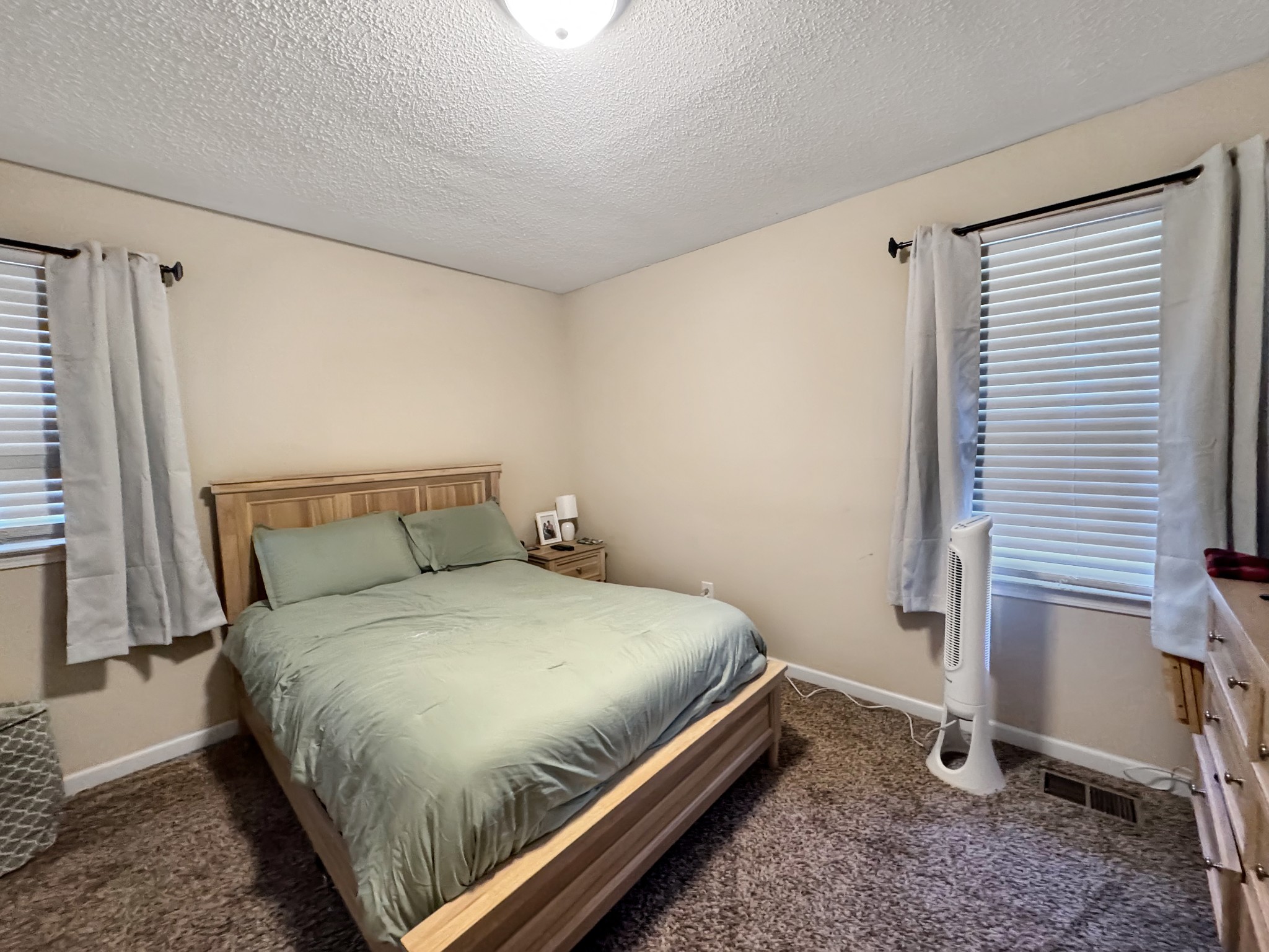 333 Main Street Dover, TN 37058 - Photo 12 of 19 a bedroom with a bed and a window