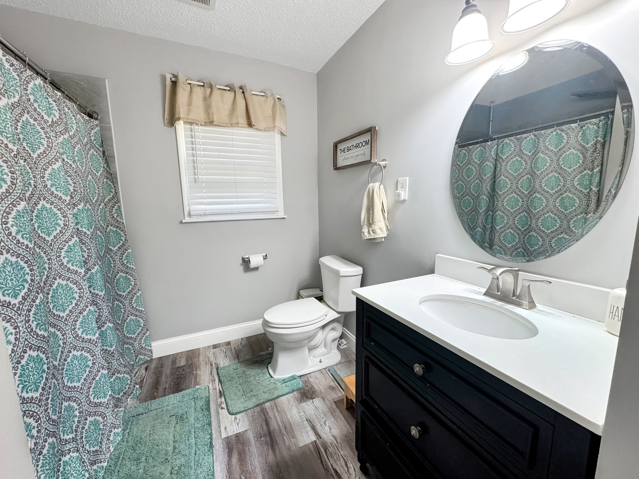 333 Main Street Dover, TN 37058 - Photo 15 of 19 a bathroom with a sink and a mirror