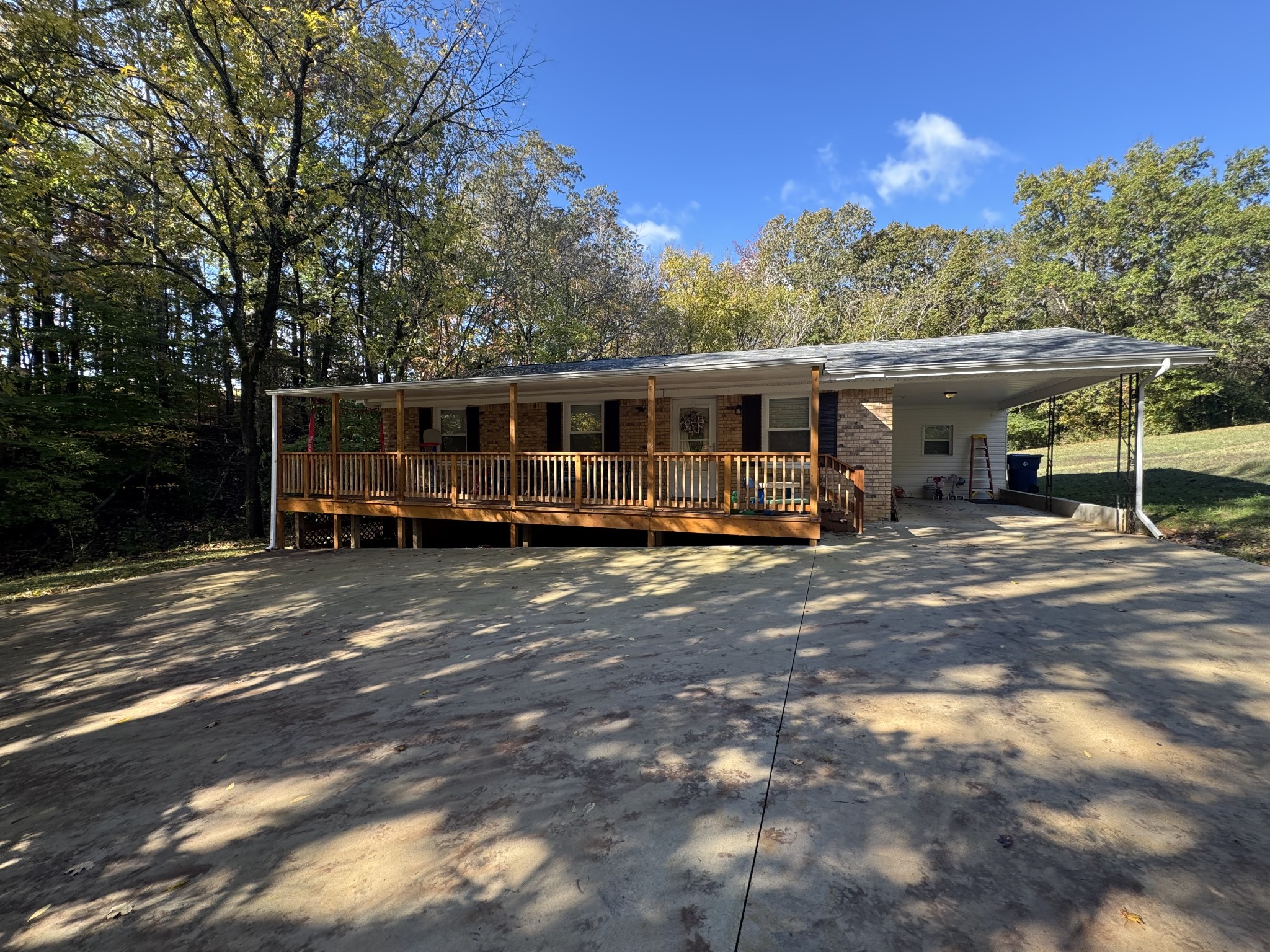 333 Main Street Dover, TN 37058 - Photo 3 of 19 a view of a house with backyard and sitting area