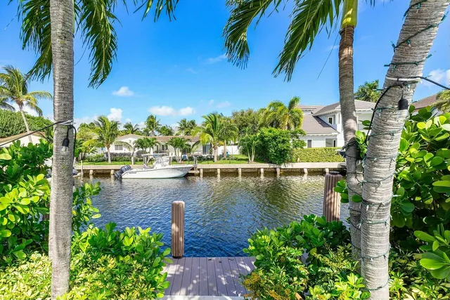 a front view of house with yard and outdoor seating