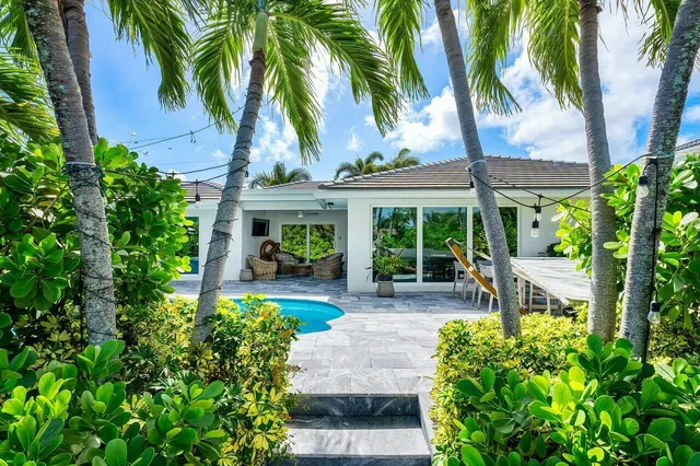 an aerial view of a house with a garden