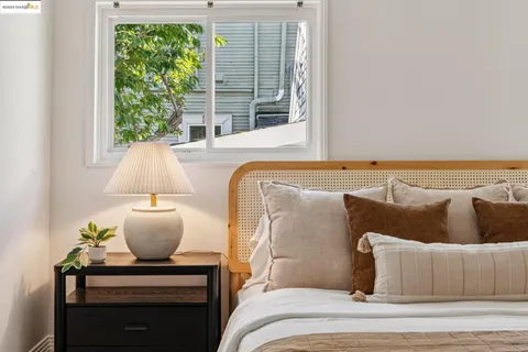 a bathroom with a toilet a sink and a mirror