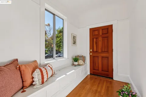 a spacious bedroom with a bed and a window