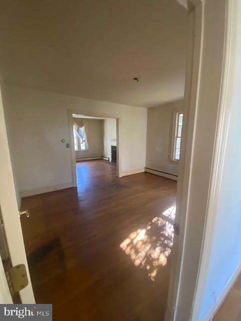 7710 Chatham Road Chevy Chase, MD 20815 - Photo 14 of 40 a view of empty room with wooden floor