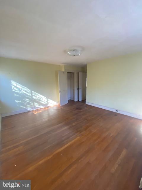 7710 Chatham Road Chevy Chase, MD 20815 - Photo 24 of 40 a view of an empty room with window and chandelier