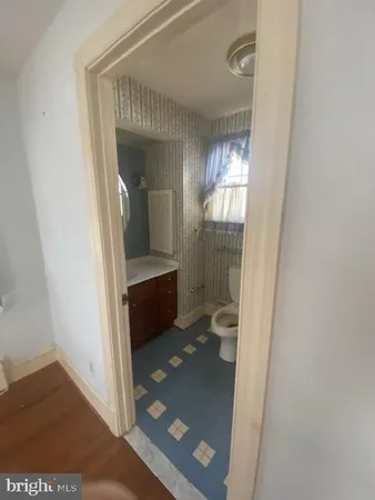 a bathroom with a mirror