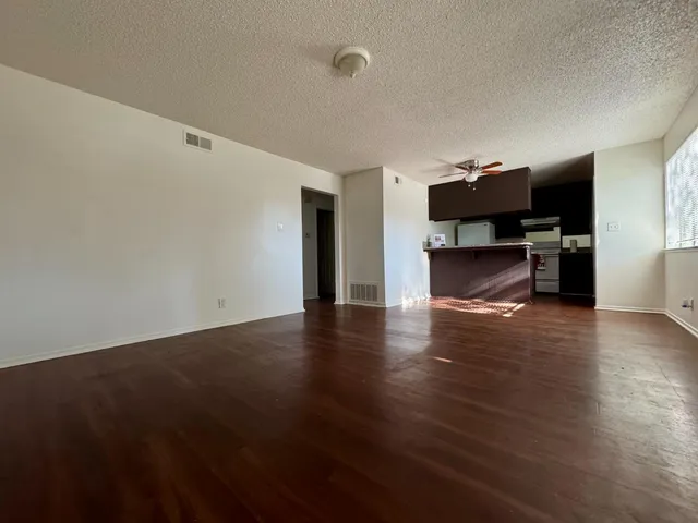 a view of livingroom with furniture and wooden floor