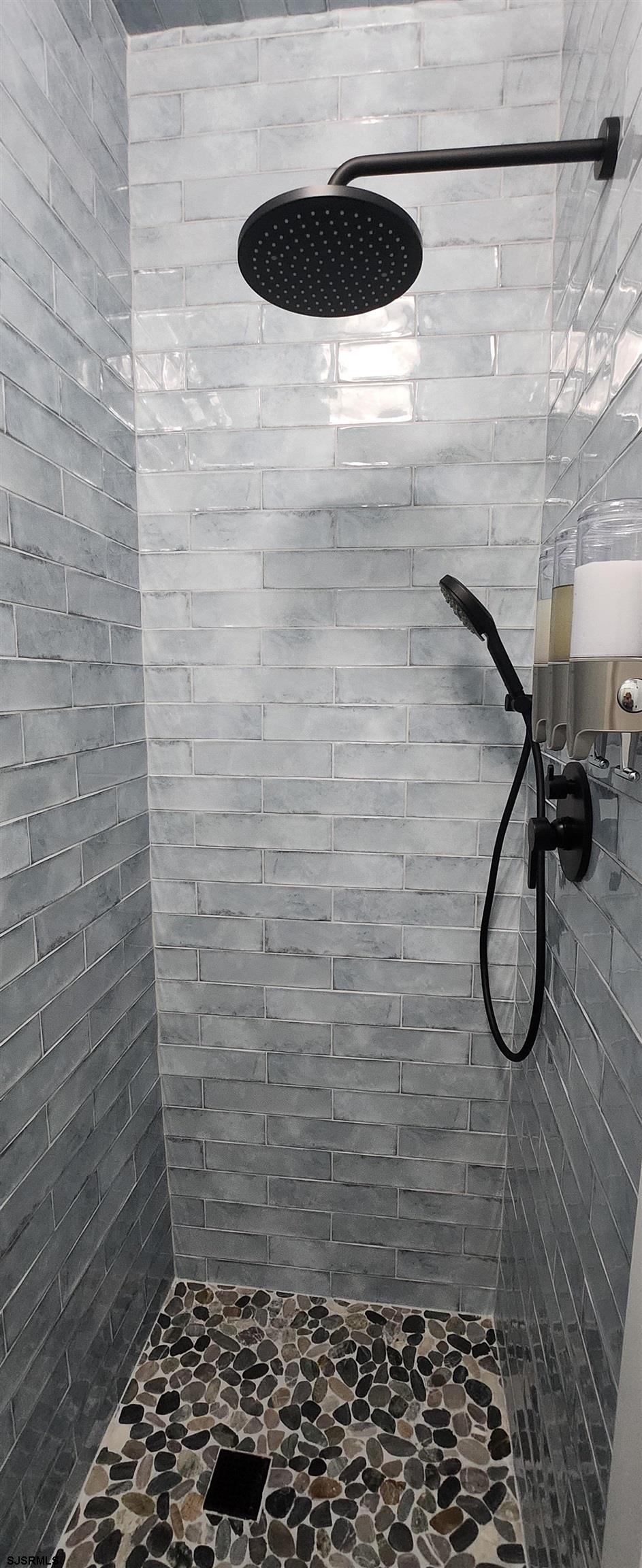 504 East Brigantine Avenue, Unit 504 Brigantine, NJ 08203 - Photo 15 of 43 a bathroom with a shower