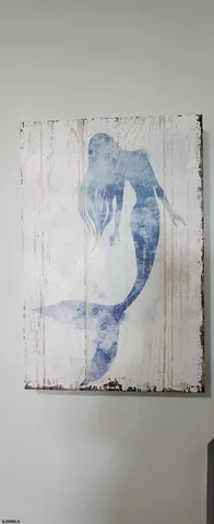 a kitchen with kitchen island granite countertop a sink a center island stainless steel appliances and cabinets