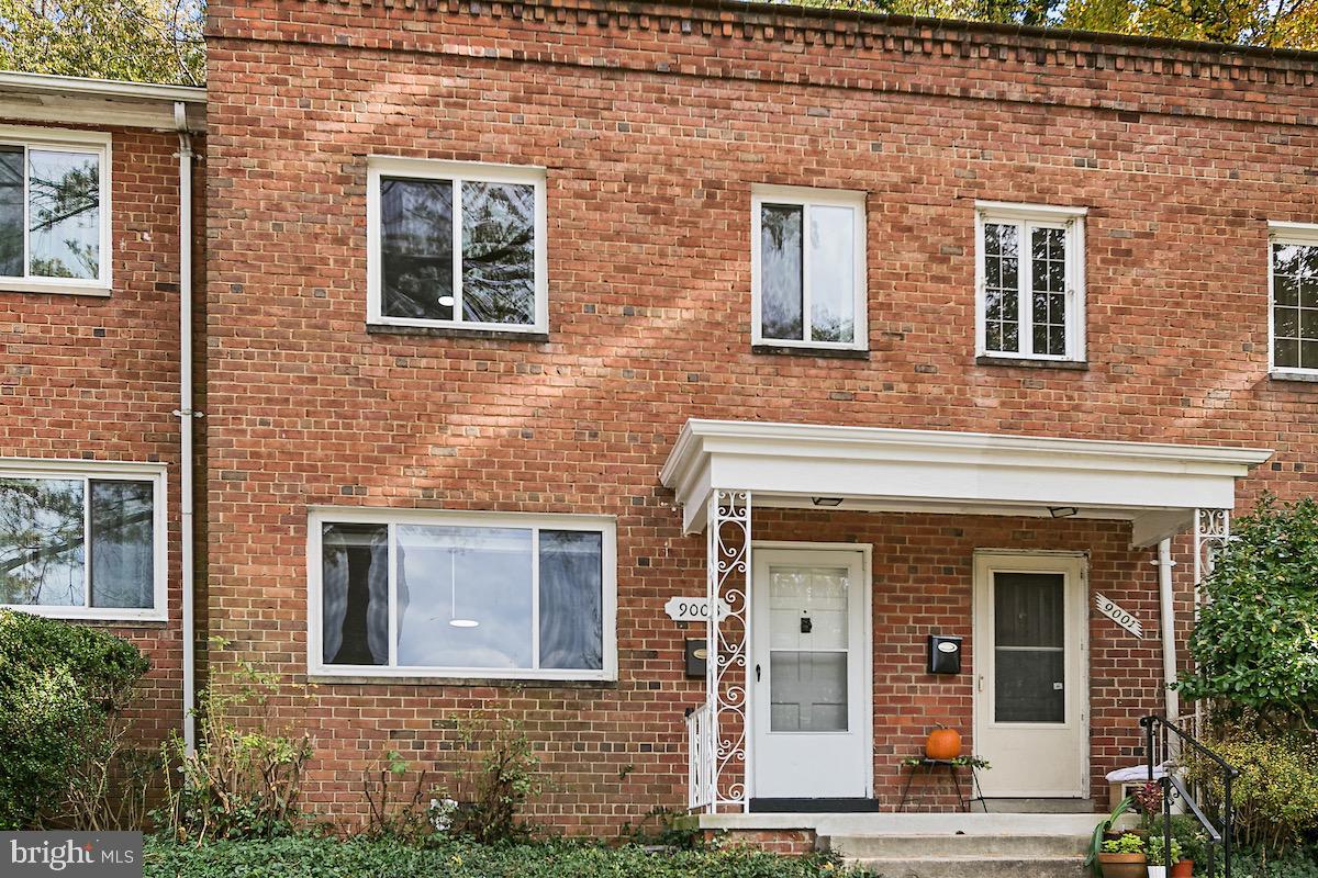 9003 Manchester Road, Unit 9003 Silver Spring, MD 20901 - Photo 40 of 53 front view of a brick house