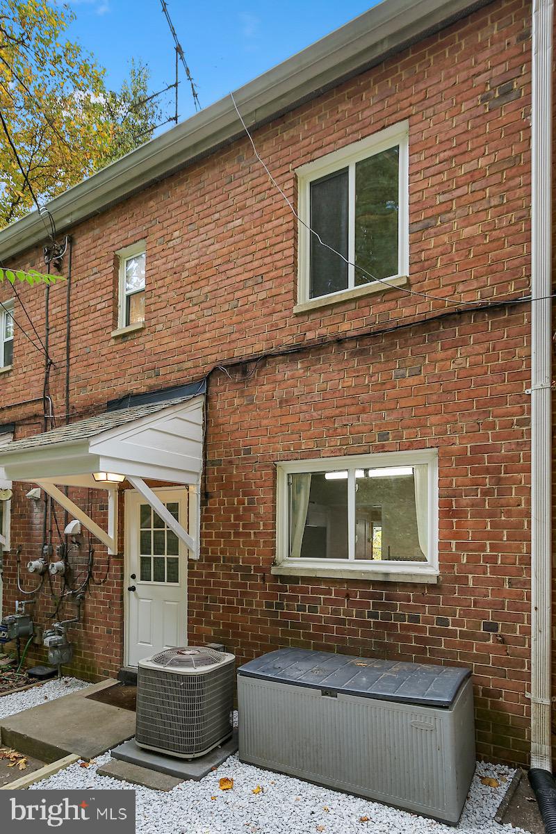 9003 Manchester Road, Unit 9003 Silver Spring, MD 20901 - Photo 45 of 53 a front view of a house with stairs