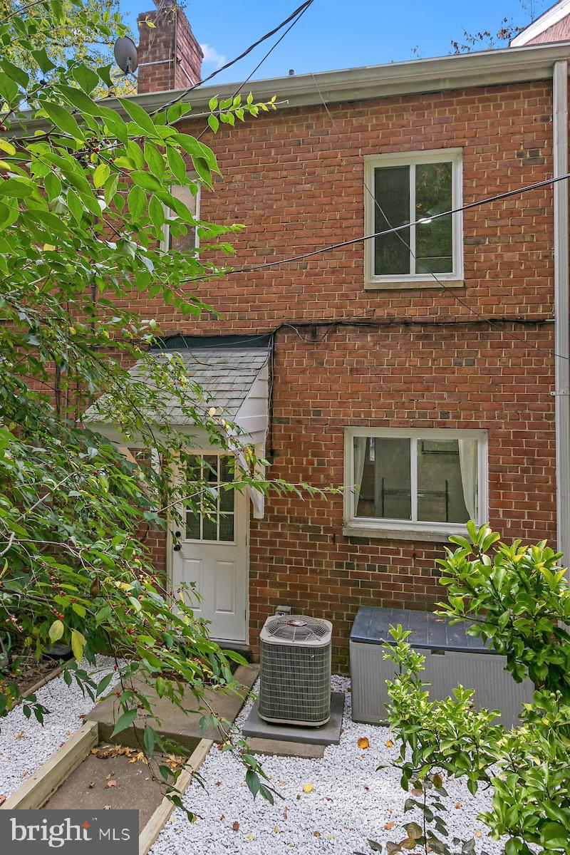 9003 Manchester Road, Unit 9003 Silver Spring, MD 20901 - Photo 46 of 53 a front view of a house with sitting area