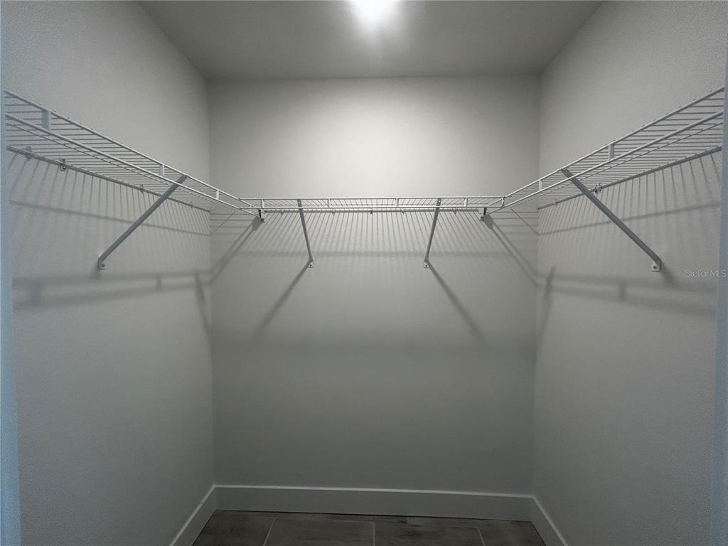498 Santiguay Street Punta Gorda, FL 33983 - Photo 11 of 28 a view of a room with racks on the wall