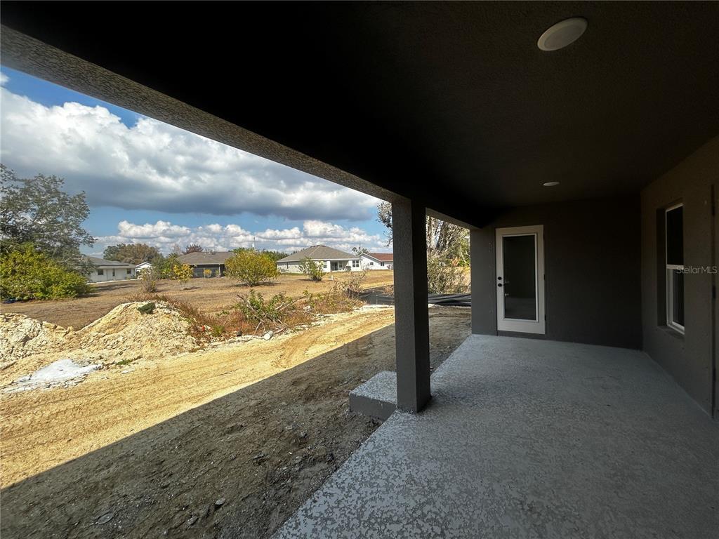 498 Santiguay Street Punta Gorda, FL 33983 - Photo 14 of 28 a view of a large mountain from a balcony