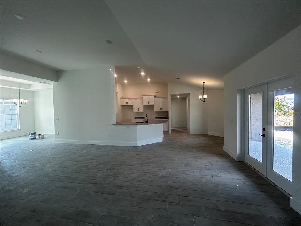 498 Santiguay Street Punta Gorda, FL 33983 - Photo 5 of 28 a view of a kitchen with a sink and cabinets