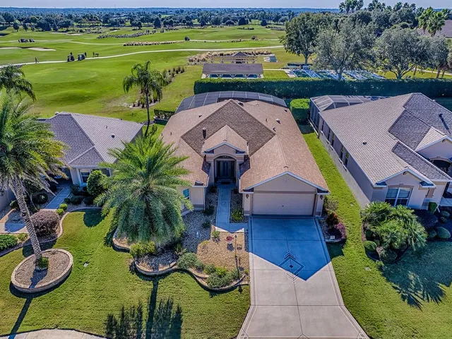 a view of livingroom with furniture and mirror