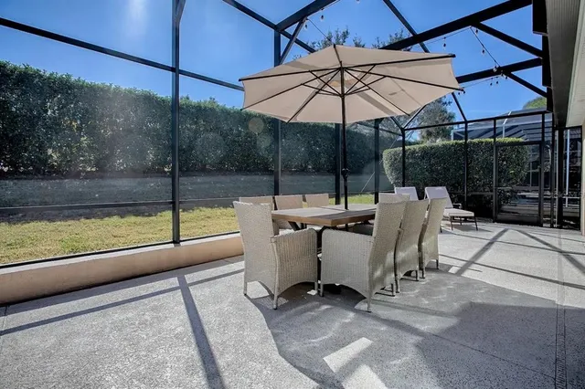 a bathroom with a shower and toilet