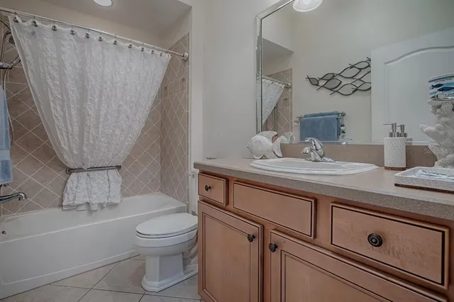an aerial view of house with yard swimming pool and outdoor seating