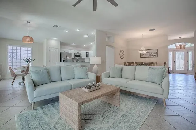 a living room with furniture and a table