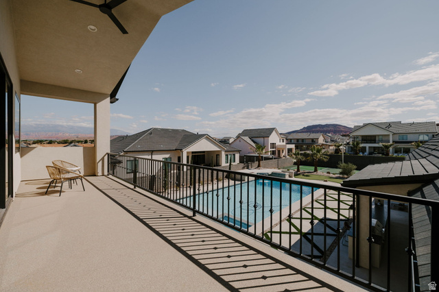 2281 South Crimson Cliffs Way St. George, UT 84790 - Photo 36 of 47 Balcony featuring a residential view and view of pool