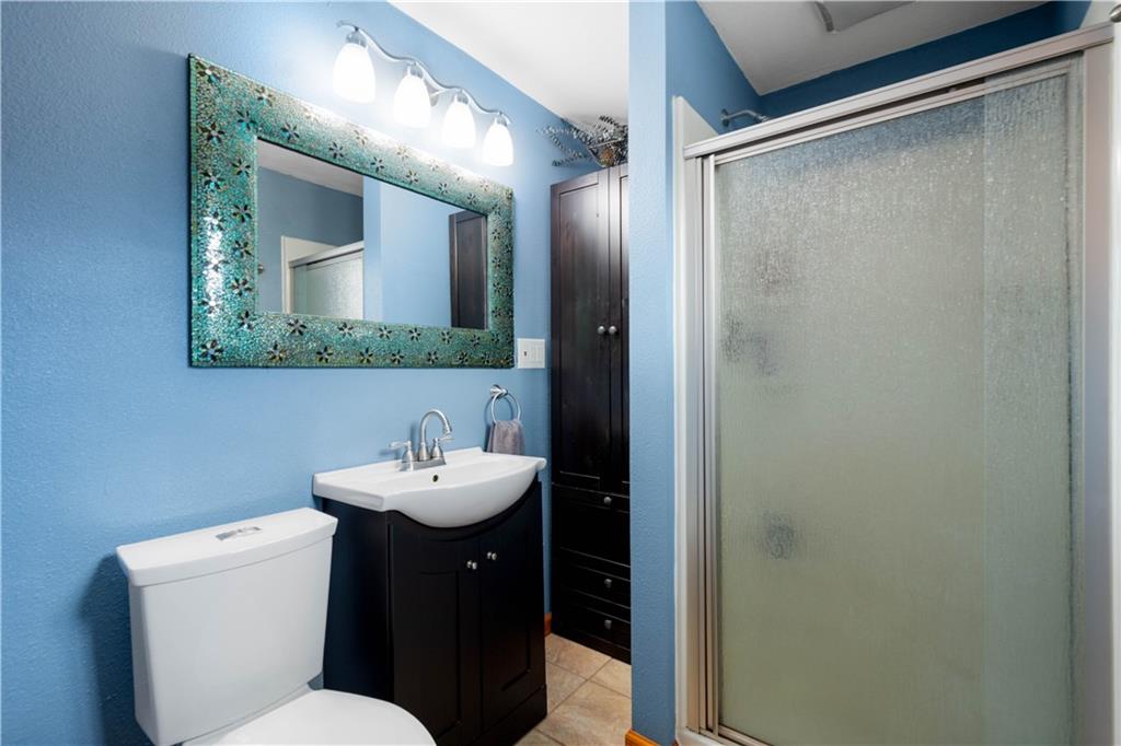 2701 College Park Road Allison Park, PA 15101 - Photo 13 of 29 a bathroom with a sink mirror and toilet