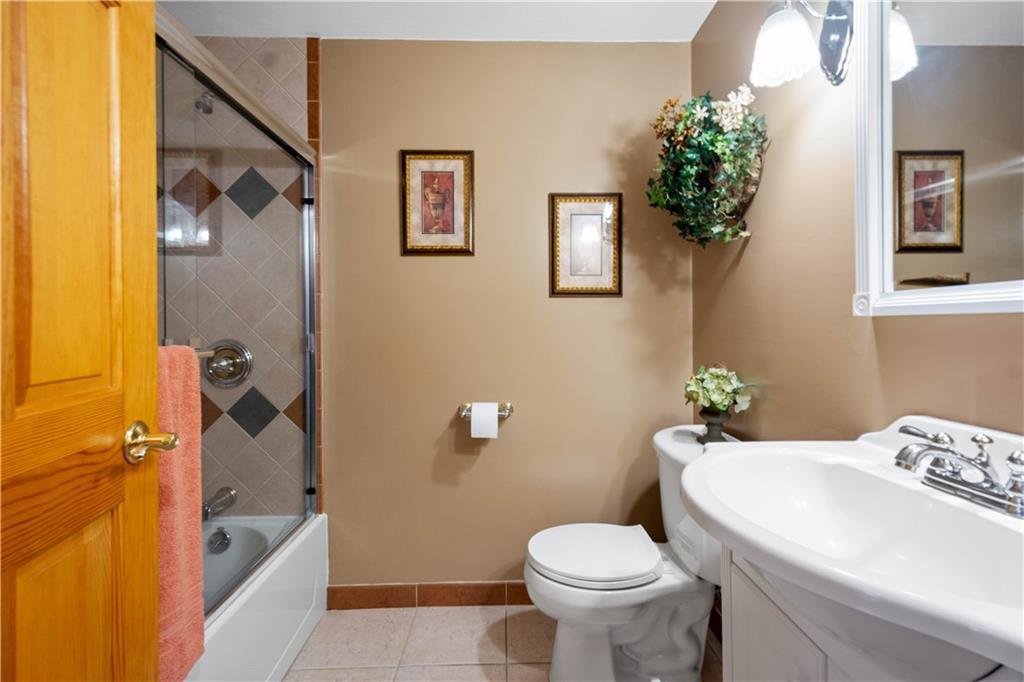 2701 College Park Road Allison Park, PA 15101 - Photo 15 of 29 a bath room with a toilet and a bath tub