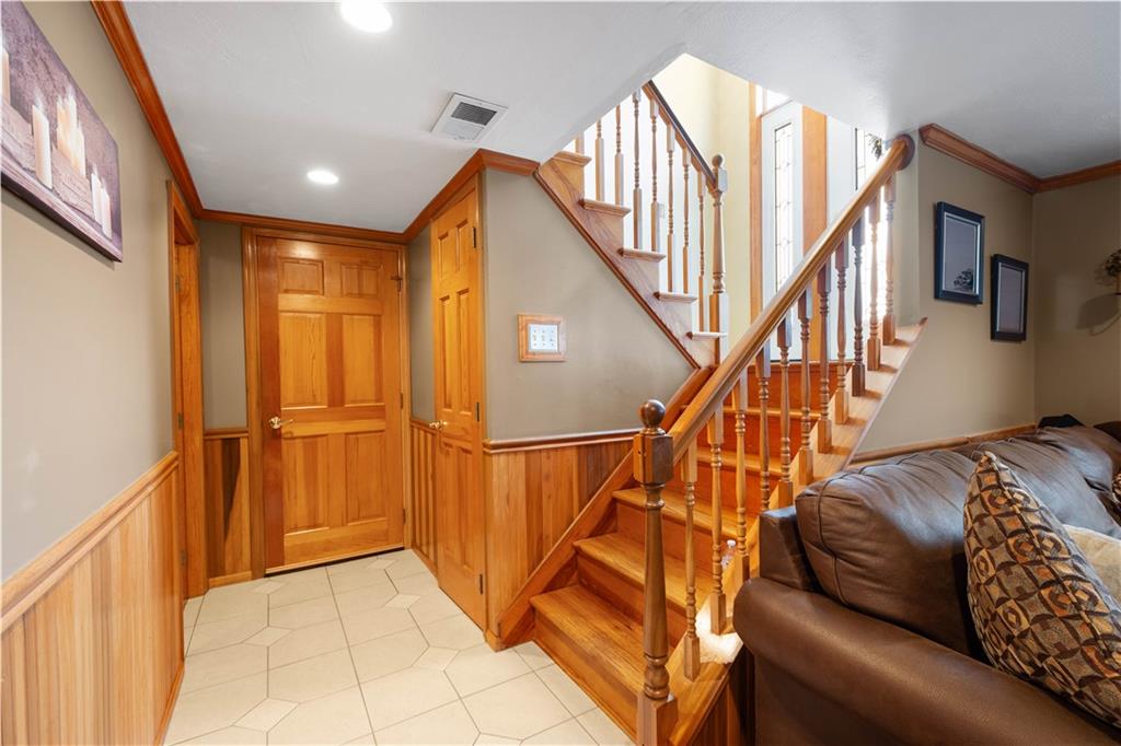 2701 College Park Road Allison Park, PA 15101 - Photo 18 of 29 a view of a livingroom with furniture and stairs