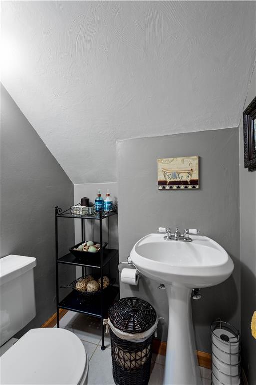 2701 College Park Road Allison Park, PA 15101 - Photo 22 of 29 a bathroom with a toilet a sink and mirror