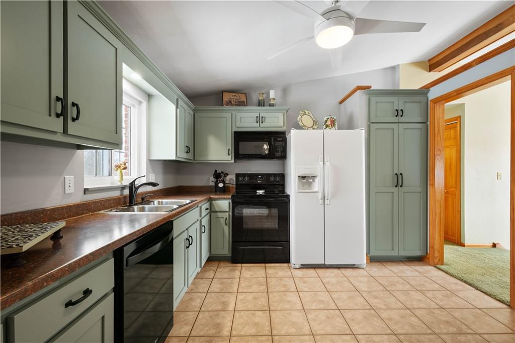 2701 College Park Road Allison Park, PA 15101 - Photo 7 of 29 a kitchen with stainless steel appliances granite countertop a refrigerator and a stove top oven