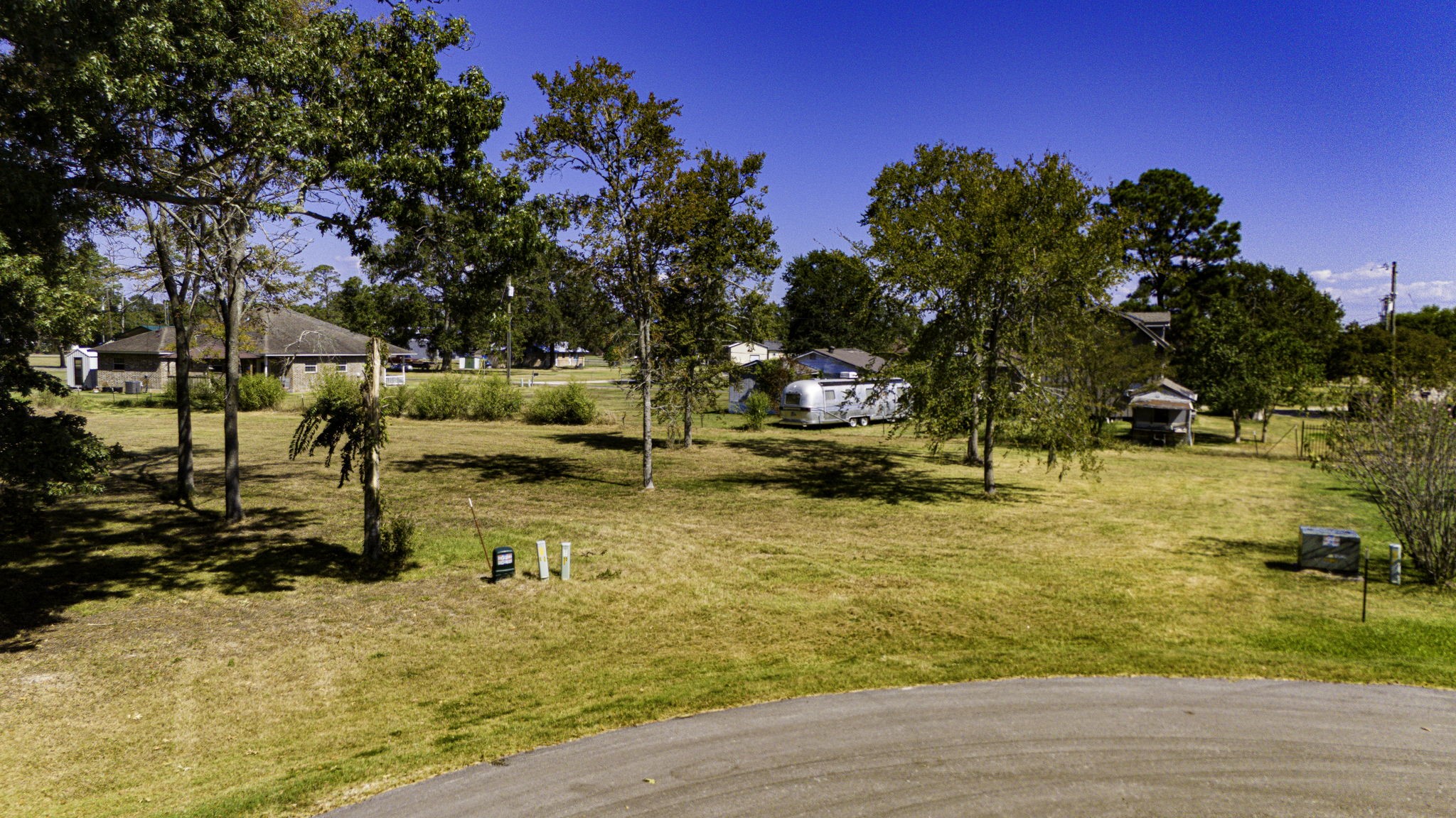 132 Legacy Boulevard Point Blank, TX 77364 - Photo 5 of 11 a view of a swimming pool with an outdoor space