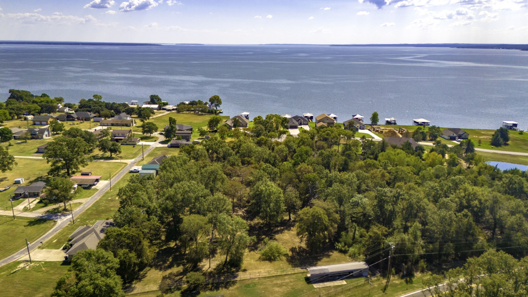 132 Legacy Boulevard Point Blank, TX 77364 - Photo 7 of 11 a view of a yard with an outdoor space