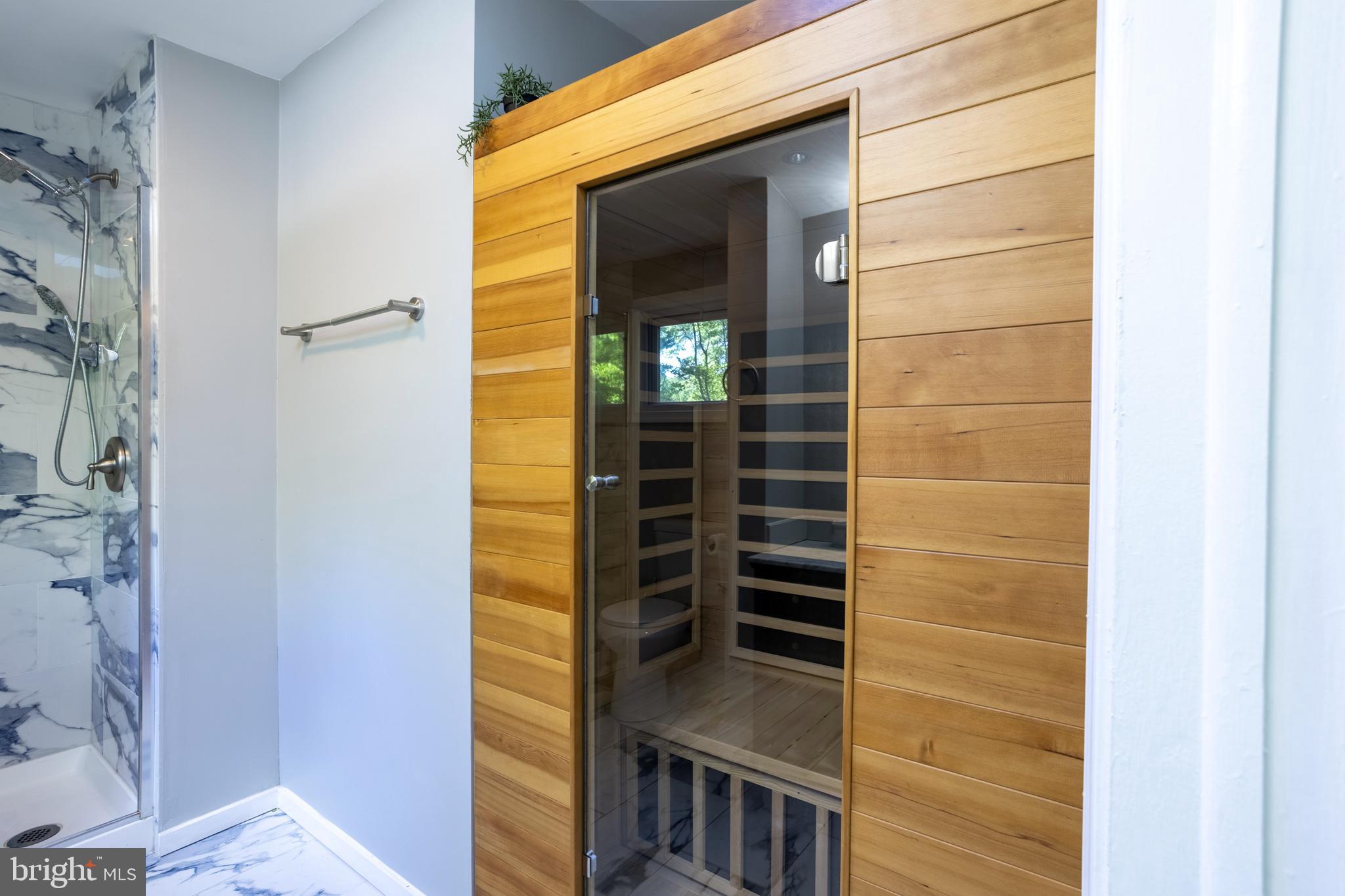 3207 Midfield Road Pikesville, MD 21208 - Photo 22 of 45 a bathroom with a shower and a sink