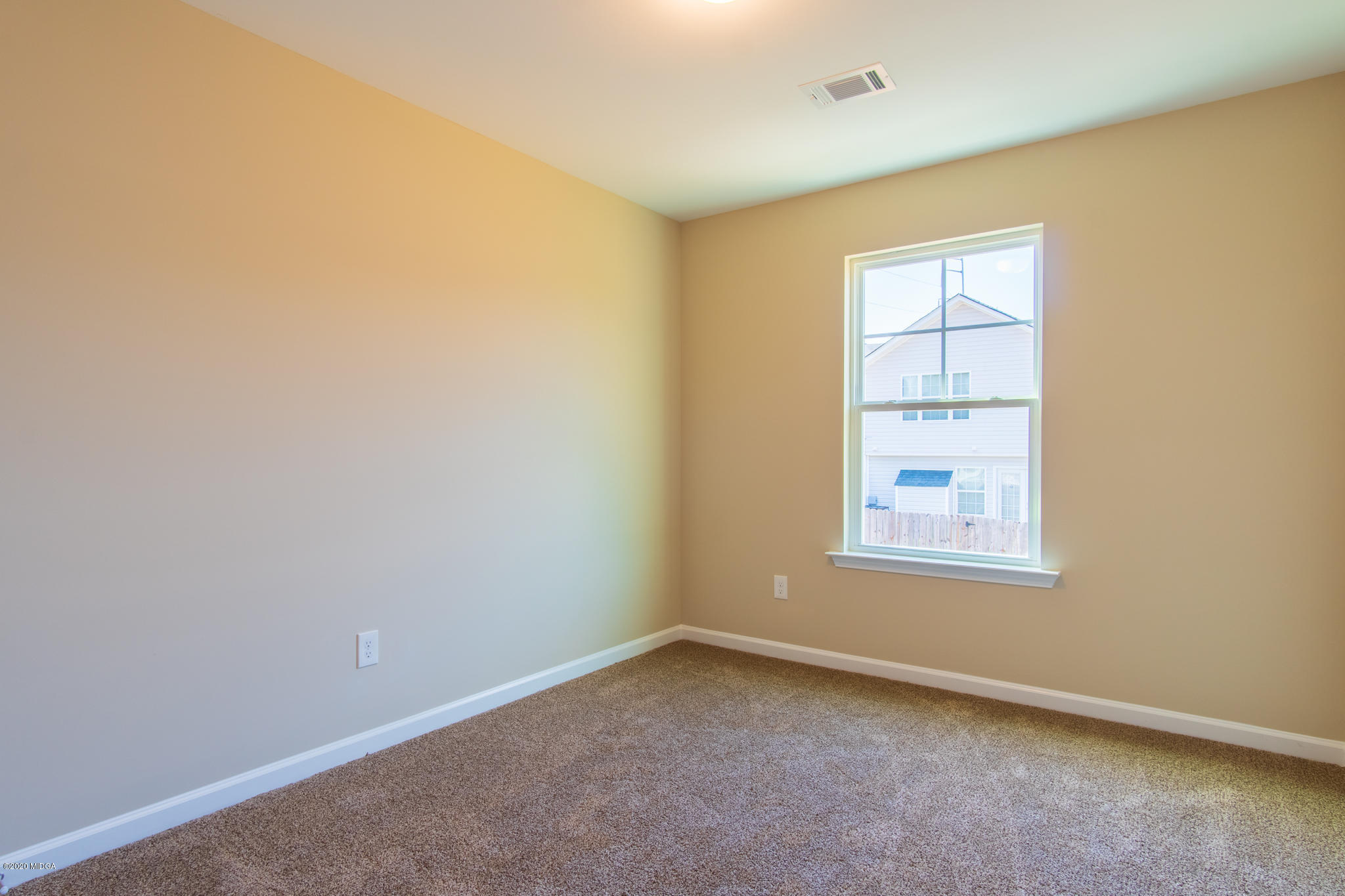 321 Pond View Road Macon, GA 31206 - Photo 14 of 22 an empty room with a window