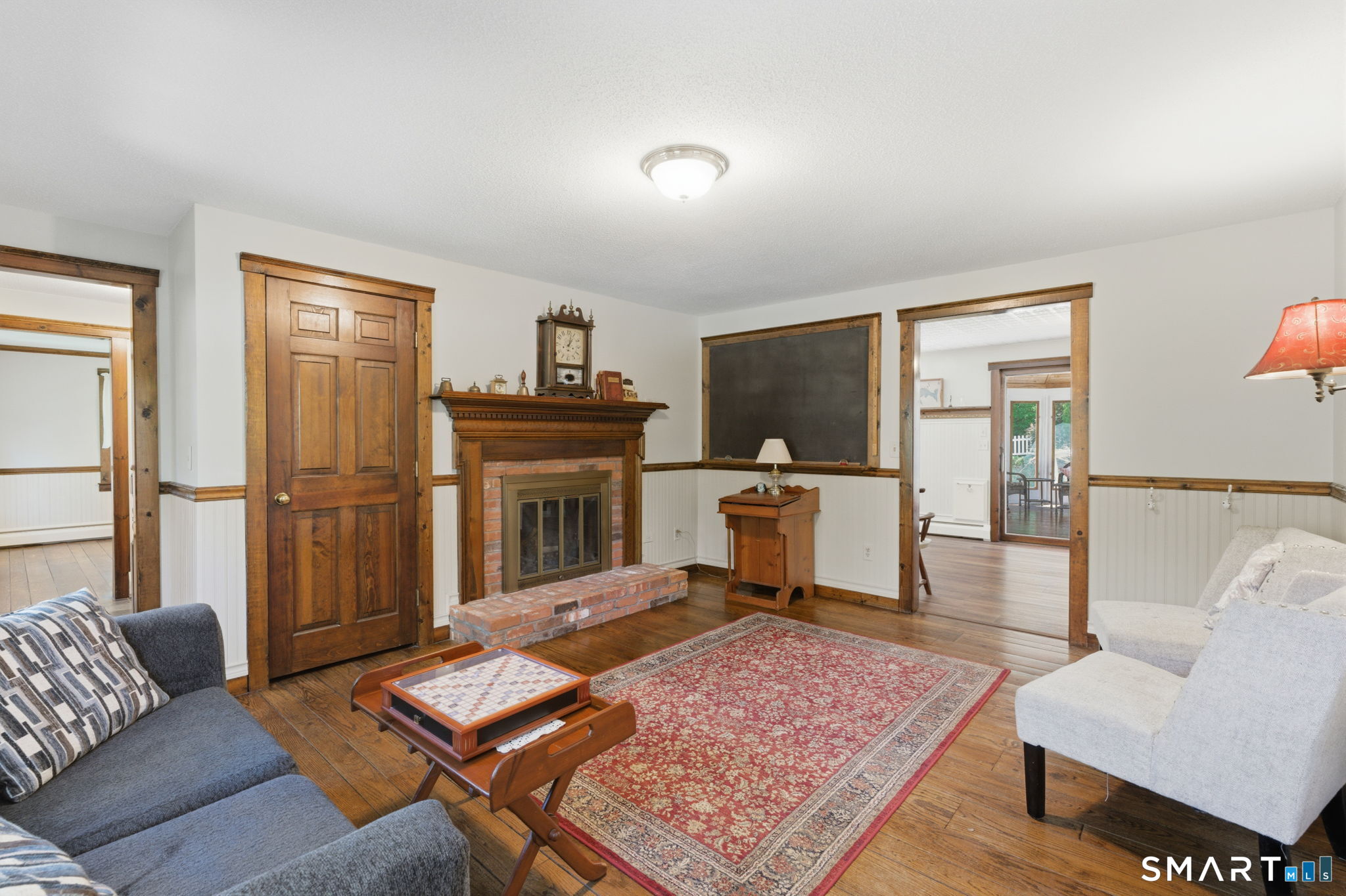 79 Buckboard Lane Bristol, CT 06010 - Photo 22 of 40 a living room with furniture and a flat screen tv