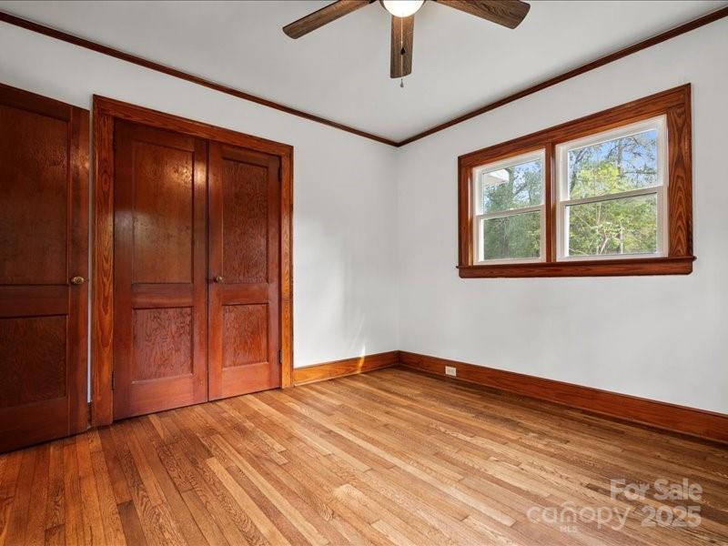 37 Lynn Avenue Cheraw, SC 29520 - Photo 16 of 30 wooden floor in an empty room with a window