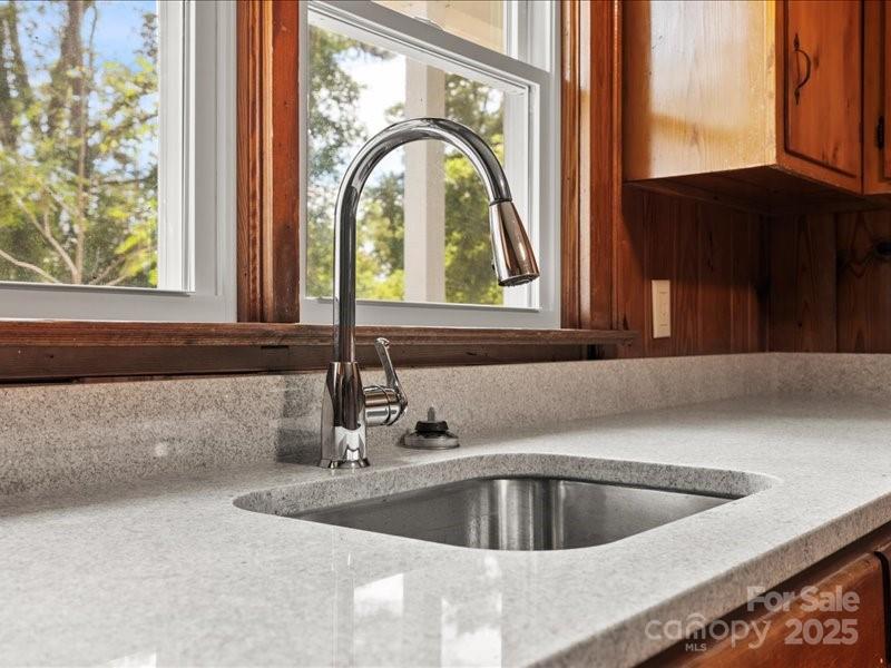 37 Lynn Avenue Cheraw, SC 29520 - Photo 19 of 30 a view of a kitchen sink and a window