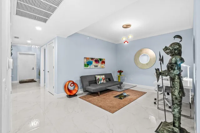 a living room with furniture and a table