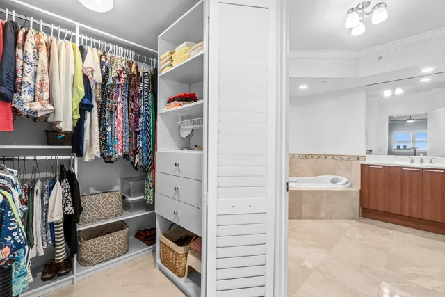 a bathroom with a shower sink and mirror