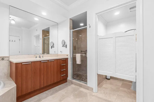 a bathroom with a toilet a sink and a mirror