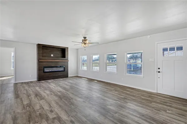 a living room with a fireplace