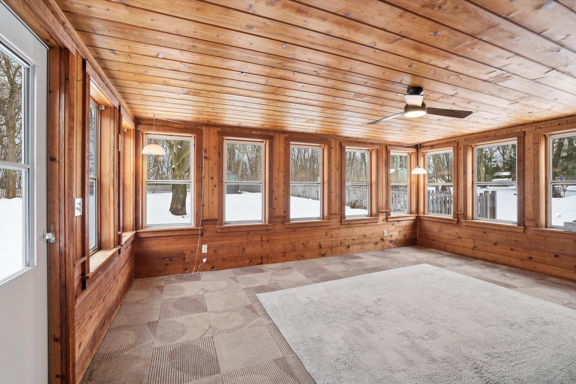 3140 Highway 164 Polk, WI 53086 - Photo 25 of 37 Three Seasons Room